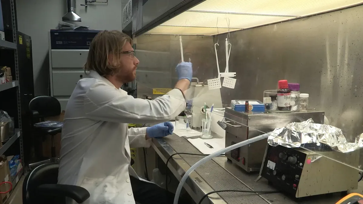 A scientist at work in a research laboratory. Representational photo; the CSIR-UGC NET December 2026 exam will be held in computer-based mode.