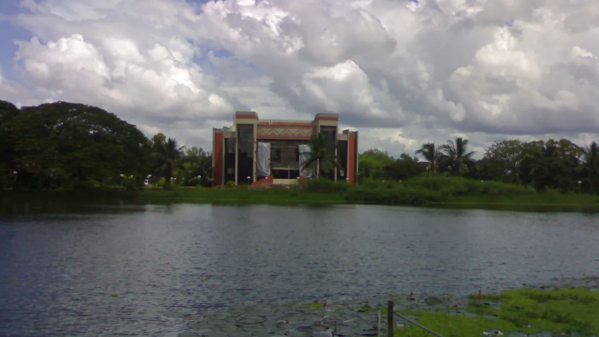 The auditorium building on IIM Calcutta's Joka campus, seen across the campus lake.